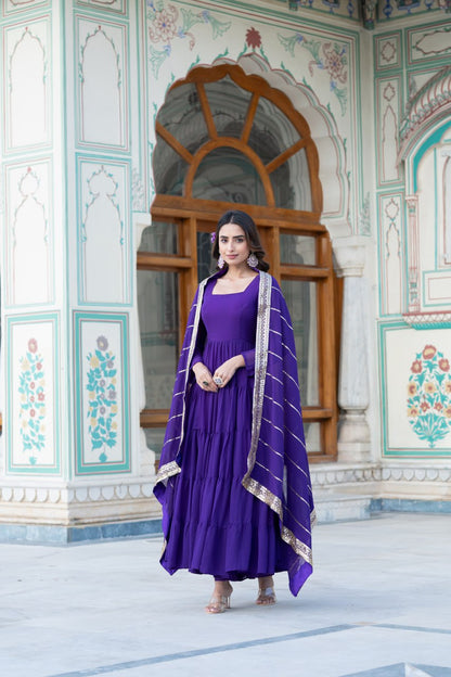 Alluring Parrot Purple Faux Georgette Gown with Sequined Dupatta